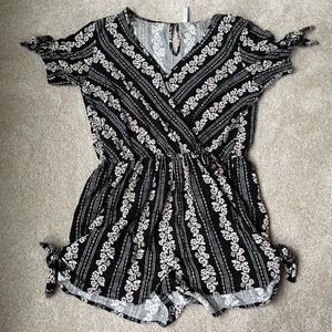 Black Romper with White/Pink Flower Details